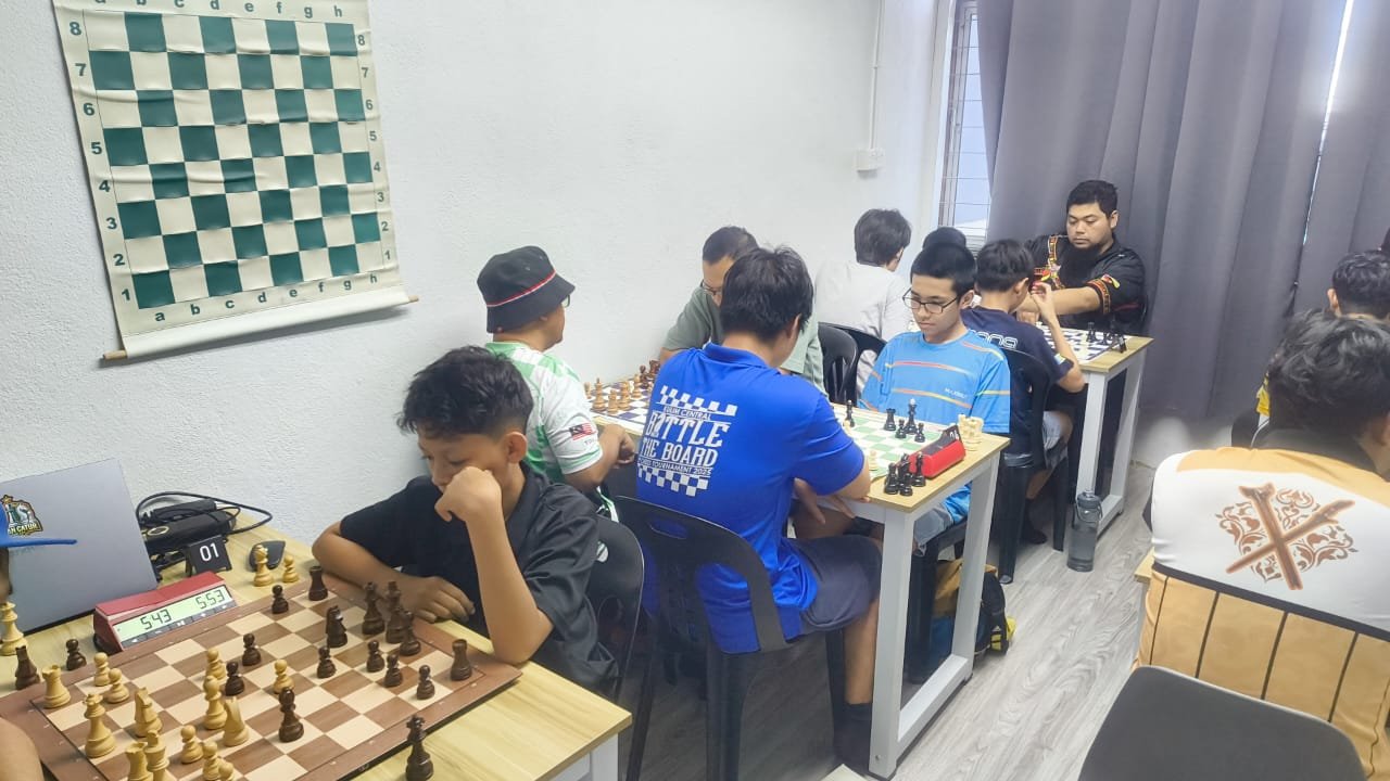 Real local chess community tournament hall with many physical boards