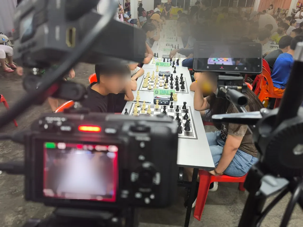 Camera and phone rig at the Keong Hoe tournament